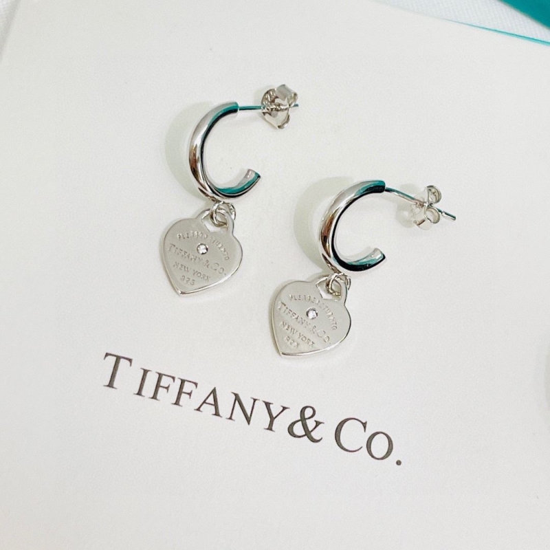 T*f*ny earrings